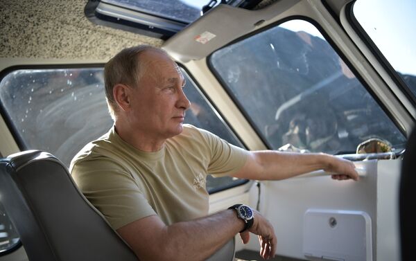 الرئيس الروسي فلاديمير بوتين خلال عطلته في جمهورية تيفا، روسيا 26 أغسطس/ آب 2018 - سبوتنيك عربي