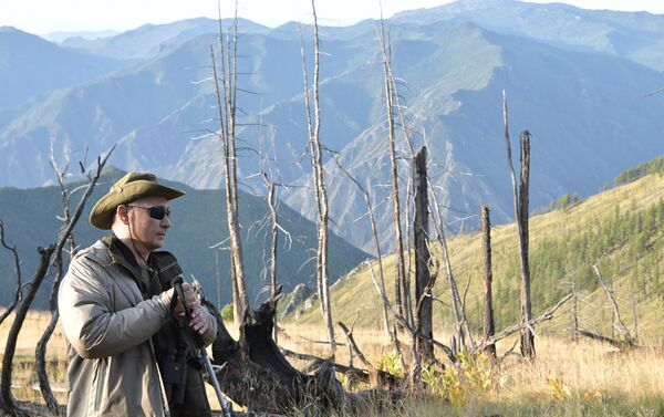 الرئيس الروسي فلاديمير بوتين خلال عطلته في جمهورية تيفا، روسيا 26 أغسطس/ آب 2018 - سبوتنيك عربي