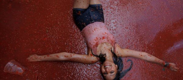 مهرجان توماتينا (التراشق بالطماطم) في إسبانيا 28 أغسطس/ آب 2018 - سبوتنيك عربي