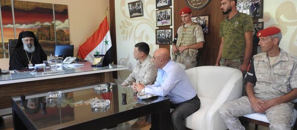 رئيس مركز المصالحة الروسي في حماة السورية يزور مدرسة الراهبات رئيس مركز المصالحة الروسي في حماة السورية يزور مدرسة الراهبات - سبوتنيك عربي