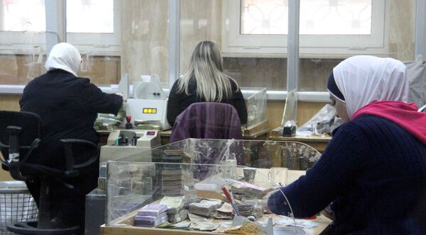 المركزي السوري يستبدل الفئات النقدية الصغيرة ويتطلع جديا نحو التداول الرقمي - سبوتنيك عربي