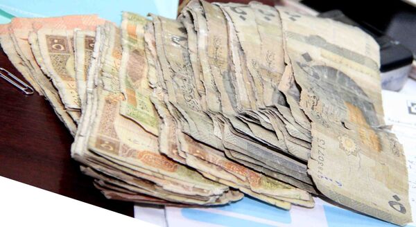 المركزي السوري يستبدل الفئات النقدية الصغيرة ويتطلع جديا نحو التداول الرقمي - سبوتنيك عربي