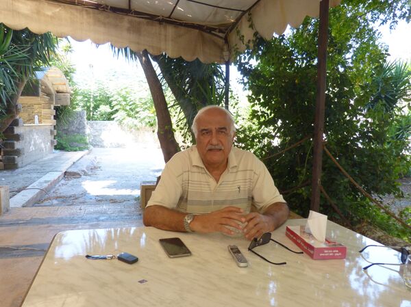 الخبير العسكري واللواء الجوي السابق في الجيش السوري رضا شريقي  - سبوتنيك عربي