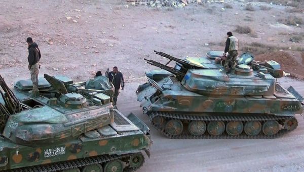 المسلحون يسلمون آليات حربية إلى القوات الحكومية السورية المسلحون يسلمون آليات حربية إلى القوات الحكومية السورية - سبوتنيك عربي