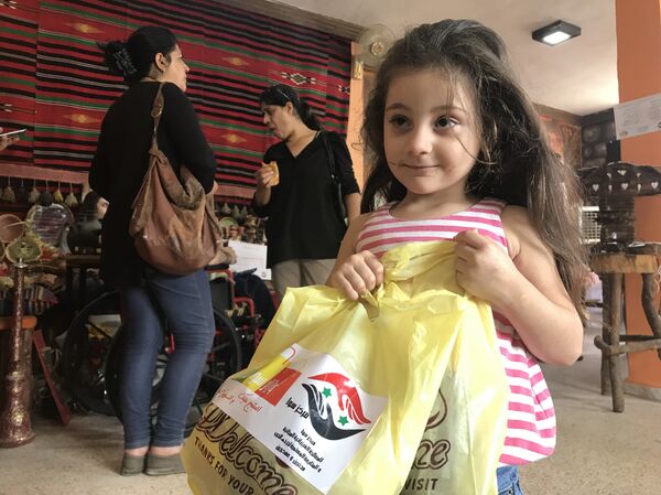 نظمت في مدينة مصياف مبادرة هي الأولى من نوعها تهتم بتسويق سلع من إنتاج أو تصنيع عدد من جرحى الجيش السوري. - سبوتنيك عربي