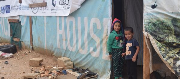 اللاجئون السوريون يستعدون لفصل الشتاء في ظل نقص المساعدات وإرتفاع أسعار المحروقات - سبوتنيك عربي