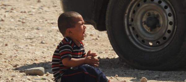 طفل سوري يبكي .. إحدى نتائج الحرب الإرهابية على سوريا - سبوتنيك عربي