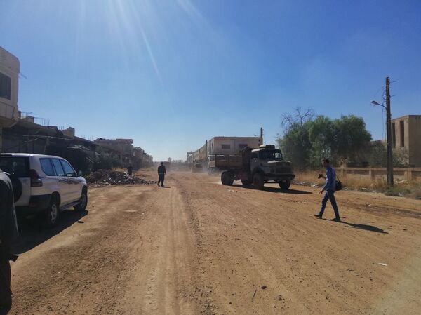 بحضور عسكري روسي.. فتح الطرق المؤدية إلى مخيم اللاجئين الفلسطينيين بدرعا - سبوتنيك عربي