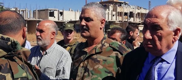 بحضور عسكري روسي.. فتح الطرق المؤدية إلى مخيم اللاجئين الفلسطينيين بدرعا - سبوتنيك عربي