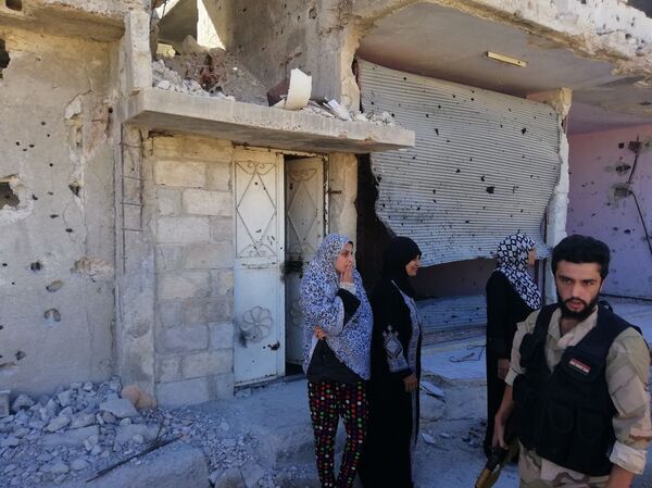 بحضور عسكري روسي.. فتح الطرق المؤدية إلى مخيم اللاجئين الفلسطينيين بدرعا - سبوتنيك عربي