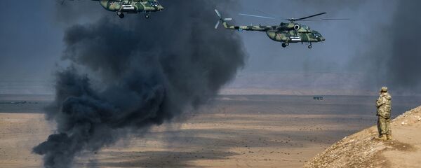 مروحيات مي-8 أ إم تي شي (تيرميناتور)، خلال مناورات مكافحة الإرهاب المشتركة لمنظمة معاهدة الأمن الجماعي في الحقل العسكري خاربمايدون في طاجيكستان - سبوتنيك عربي