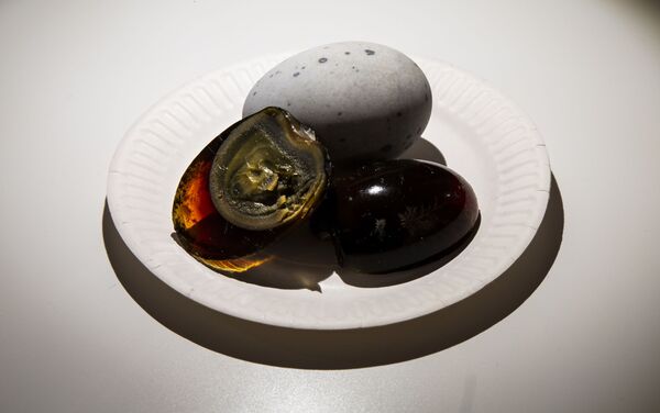 وجبة خفيفة في المطبخ الصيني بيضة عمرها 100 عام وجبة خفيفة في المطبخ الصيني بيضة عمرها 100 عام - سبوتنيك عربي