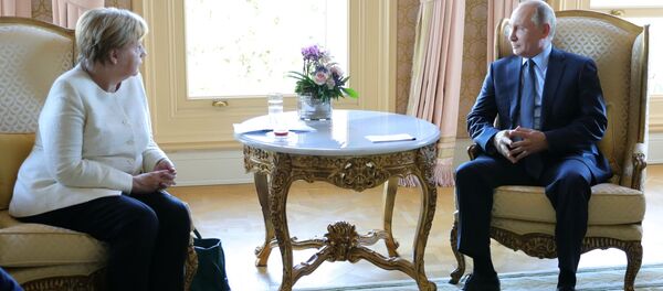  المستشارة الألمانية أنجيلا ميركل والرئيس الروسي فلاديمير بوتين في اسطنبول، تركيا 27 أكتوبر/ تشرين الأول 2018 - سبوتنيك عربي