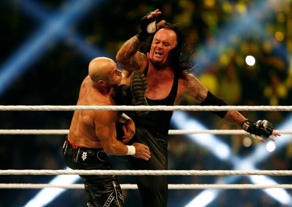 المصارعان أندرتيكر وشون مايكلز في مهرجان كراون جول في الرياض، 2 نوفمبر/تشرين الثاني 2018 المصارعان أندرتيكر وشون مايكلز في مهرجان كراون جول في الرياض، 2 نوفمبر/تشرين الثاني 2018 - سبوتنيك عربي