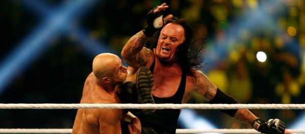 المصارعان أندرتيكر وشون مايكلز في مهرجان كراون جول في الرياض، 2 نوفمبر/تشرين الثاني 2018 - سبوتنيك عربي