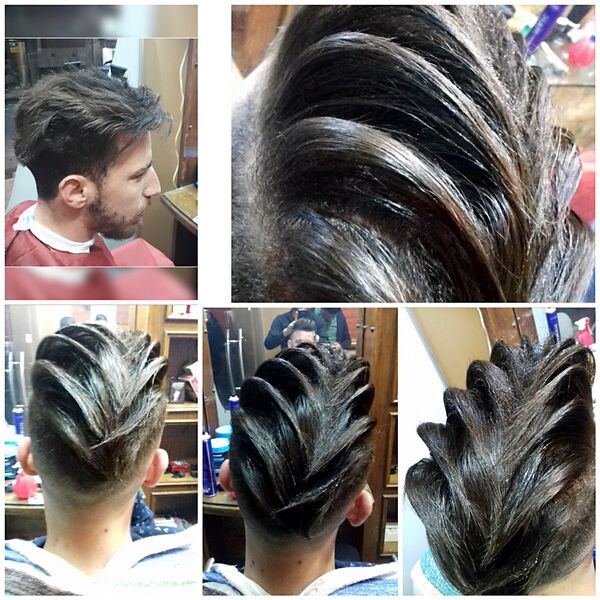 بالنار بدل المقص... حلاق يقود موضة التسريحات الحلبية  - سبوتنيك عربي