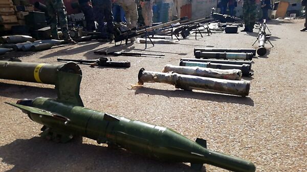 الجيش السوري يعثر على كميات كبيرة من أسلحة الإرهابيين، منها صواريخ أمريكية، في درعا - سبوتنيك عربي