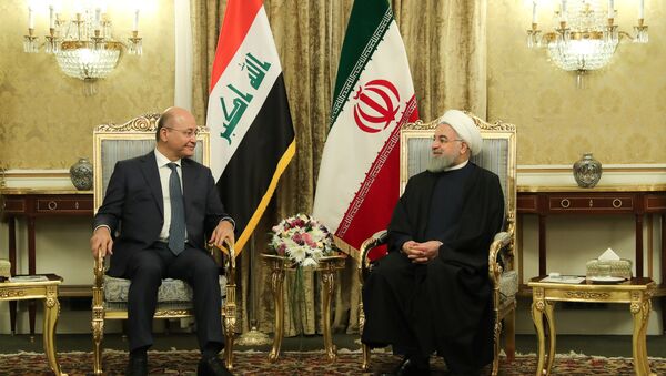 الرئيس الإيراني حسن روحاني يلتقي بالرئيس العراقي برهم صالح في طهران، 17 نوفمبر/ تشرين الثاني 2018 - سبوتنيك عربي