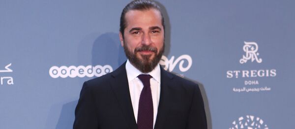 الممثل التركي إنغين ألتان على السجادة الحمراء في مهرجان أجيال للسينما في العاصمة القطرية الدوحة، 28 نوفمبر/ تشرين الثاني 2018 - سبوتنيك عربي