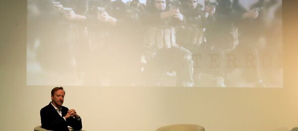 أليكس يونغر رئيس جهاز المخابرات المعروف باسم MI6 يلقي خطابًا في جامعة سانت أندروز  في إسكتلندا - سبوتنيك عربي