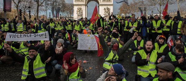 مظاهرات السترات الصفراء، احتجاجت في باريس، فرنسا ديسمبر/ كانون الأول 2018 - سبوتنيك عربي