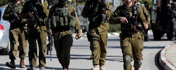 الجنود الإسرائيليون - اشتباكات مع الفلسطينيين في رام الله، الضفة الغربية 10 ديسمبر/ كانون الأول 2018 - سبوتنيك عربي