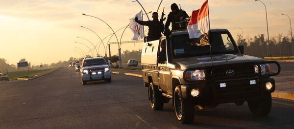 الأسود تحمي مدينة عراقية محررة من داعش - سبوتنيك عربي