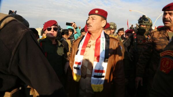 الأسود تحمي مدينة عراقية محررة من داعش - سبوتنيك عربي