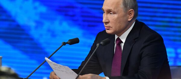 المؤتمر الصحفي السنوي للرئيس الروسي فلاديمير بوتين في موسكو، 220 ديسمبر/ كانون الأول 2018 - سبوتنيك عربي