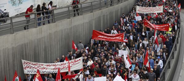شيوعيون خلال تظاهرة مطلبية في لبنان - سبوتنيك عربي