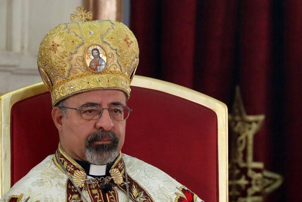 بطريرك الكاثوليك إبراهيم إسحق سيدراك يرأس قداس عيد الميلاد في كاتدرائية العذراء مريم بمدينة نصر - سبوتنيك عربي