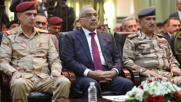 رئيس الوزراء العراقي عادل عبد المهدي يحضر الاحتفال بالذكرى السنوية الأولى لهزيمة داعش في بغداد - سبوتنيك عربي
