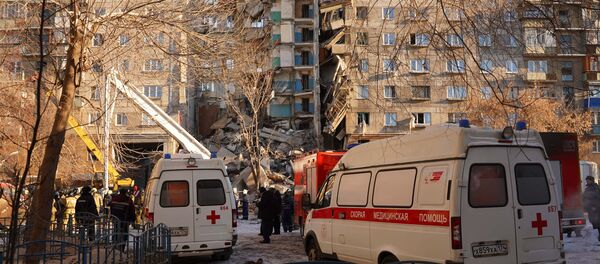 أنقاض المبنى السكني المنهار بسبب انفجار الغاز في ماغنيتاغورسك أنقاض المبنى السكني المنهار بسبب انفجار الغاز في ماغنيتاغورسك - سبوتنيك عربي