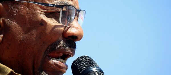 احتجاجات في السودان - مسيرات مؤيدة للرئيس السوداني عمر البشير في الخرطوم، 9 يناير/ كانون الثاني 2019 - سبوتنيك عربي