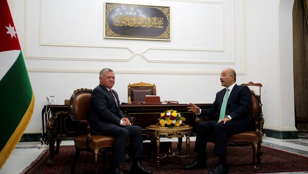 الرئيس العراقي برهم صالح، والعاهل الأردني الملك عبد الله الثاني - سبوتنيك عربي
