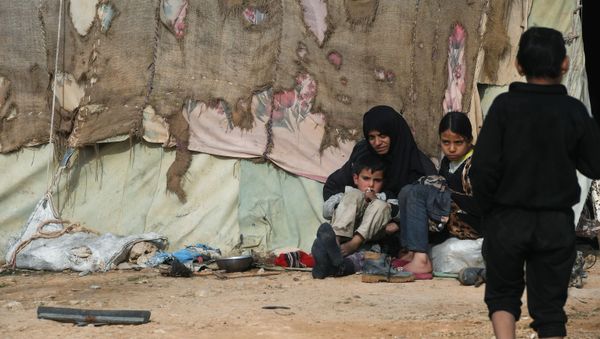 مخيم اللاجئين، النازحين السوريين من تدمر، في ريف حمص، سوريا مخيم اللاجئين، النازحين السوريين من تدمر، في ريف حمص، سوريا - سبوتنيك عربي