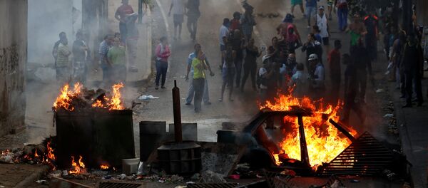 مظاهرات في كاراكاس، فنزويلا 21 يناير/ كانون الثاني 2019 مظاهرات في كاراكاس، فنزويلا 21 يناير/ كانون الثاني 2019 - سبوتنيك عربي