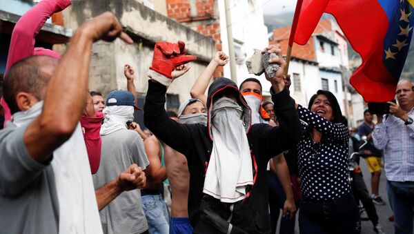 مظاهرات في كاراكاس، فنزويلا 21 يناير/ كانون الثاني 2019 - سبوتنيك عربي