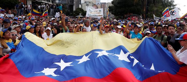 مظاهرات في كاراكاس، فنزويلا 23 يناير/ كانون الثاني 2019 - سبوتنيك عربي