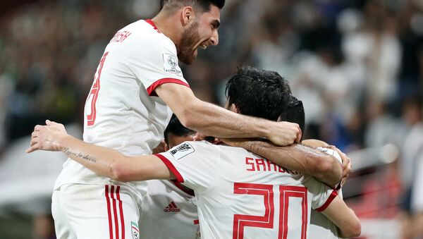فرحة لاعبي إيران خلال مباراة دور الثمانية مع الصين في بطولة كأس آسيا - سبوتنيك عربي