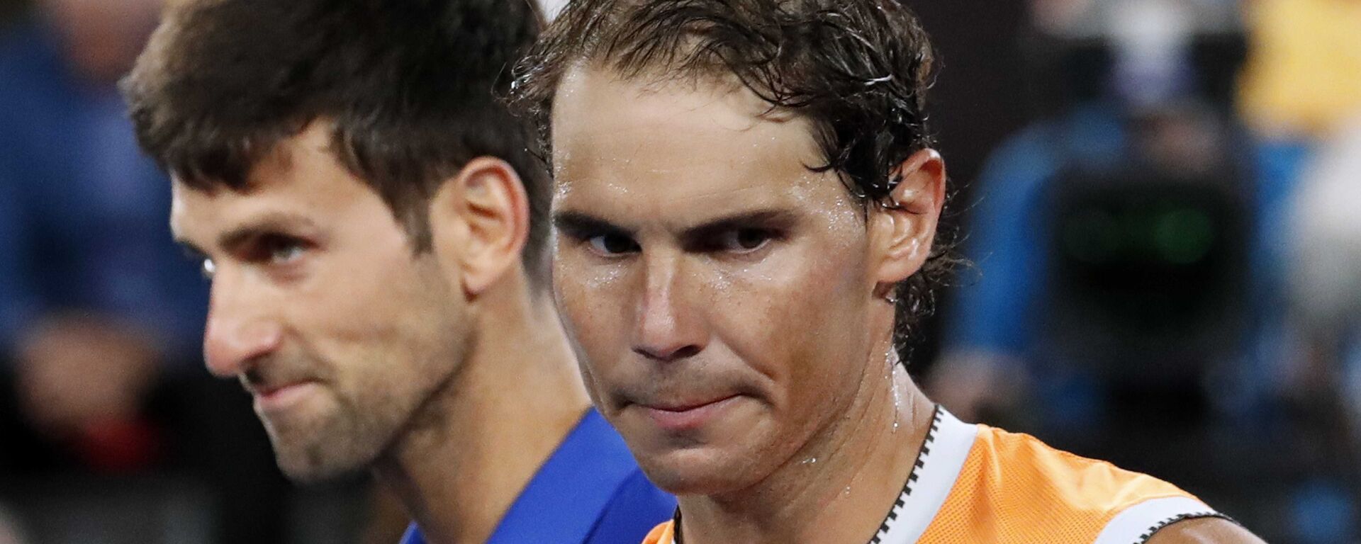 الإسباني رفائيل نادال مصدوما عقب هزيمته أمام الصربي نوفاك ديوكوفيتش، واقتناص منه بطولة أستراليا المفتوحة للتنس، 27 يناير/كانون الثاني 2019 - سبوتنيك عربي, 1920, 06.01.2022