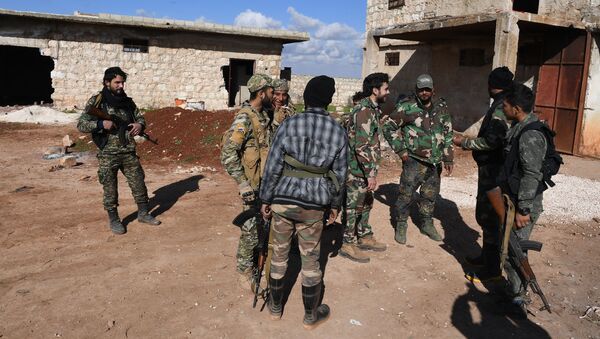 الدفاع الوطني السوري في مواقع قتالية معاكسة لـ جبهة النصرة في ريف حلب، سوريا يناير/ كانون الثاني 2019 - سبوتنيك عربي