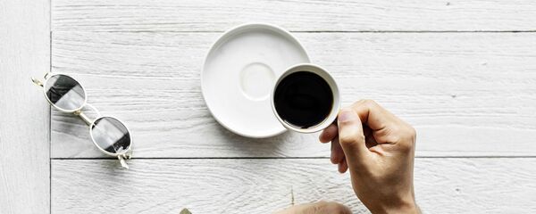 رجل يشرب القهوة - سبوتنيك عربي