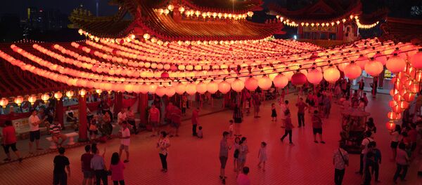 الاحتفال برأس السنة القمرية الصينية الجديدة في معبد في كوالالمبور، ماليزيا 4 فبراير/ شباط 2019 - سبوتنيك عربي