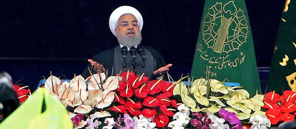 الذكرى الـ 40 على الثورة الإسلامية الإيرانية، اسقطا نظام الشاه في 1979، مسيرات في طهران، إيران 11 فبراير/ شباط 2019 - الرئيس الإيراني حسن روحاني - سبوتنيك عربي