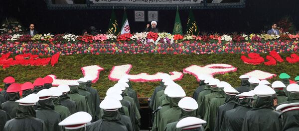 الذكرى الـ 40 على الثورة الإسلامية الإيرانية، اسقطا نظام الشاه في 1979، مسيرات في طهران، إيران 11 فبراير/ شباط 2019 - الرئيس الإيراني حسن روحاني - سبوتنيك عربي