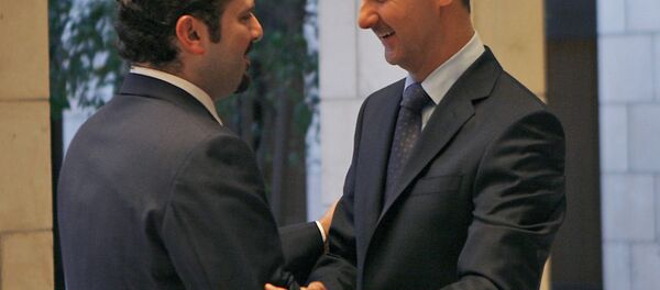 سعد الحريري وبشار الأسد - سبوتنيك عربي