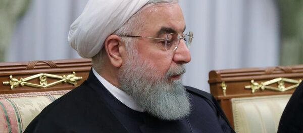 الرئيس الروسي فلاديمير بوتين ونظيره الإيراني حسن روحاني في لقاء سوتشي، روسيا 14 فبراير/ شباط 2019 - سبوتنيك عربي