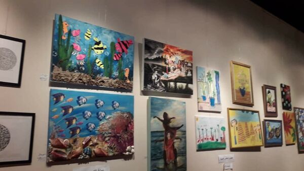 لوحات معروضة في احتفالية وزارة الثقافة المصرية الخاصة باليوم الإماراتي لـ أصحاب الهمم - سبوتنيك عربي