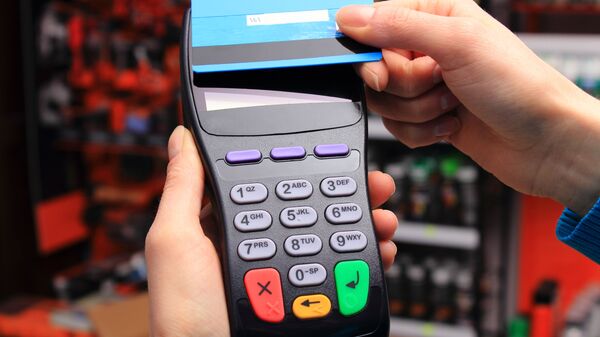 جهاز دفع متنقل للبطاقات البنكية - سبوتنيك عربي